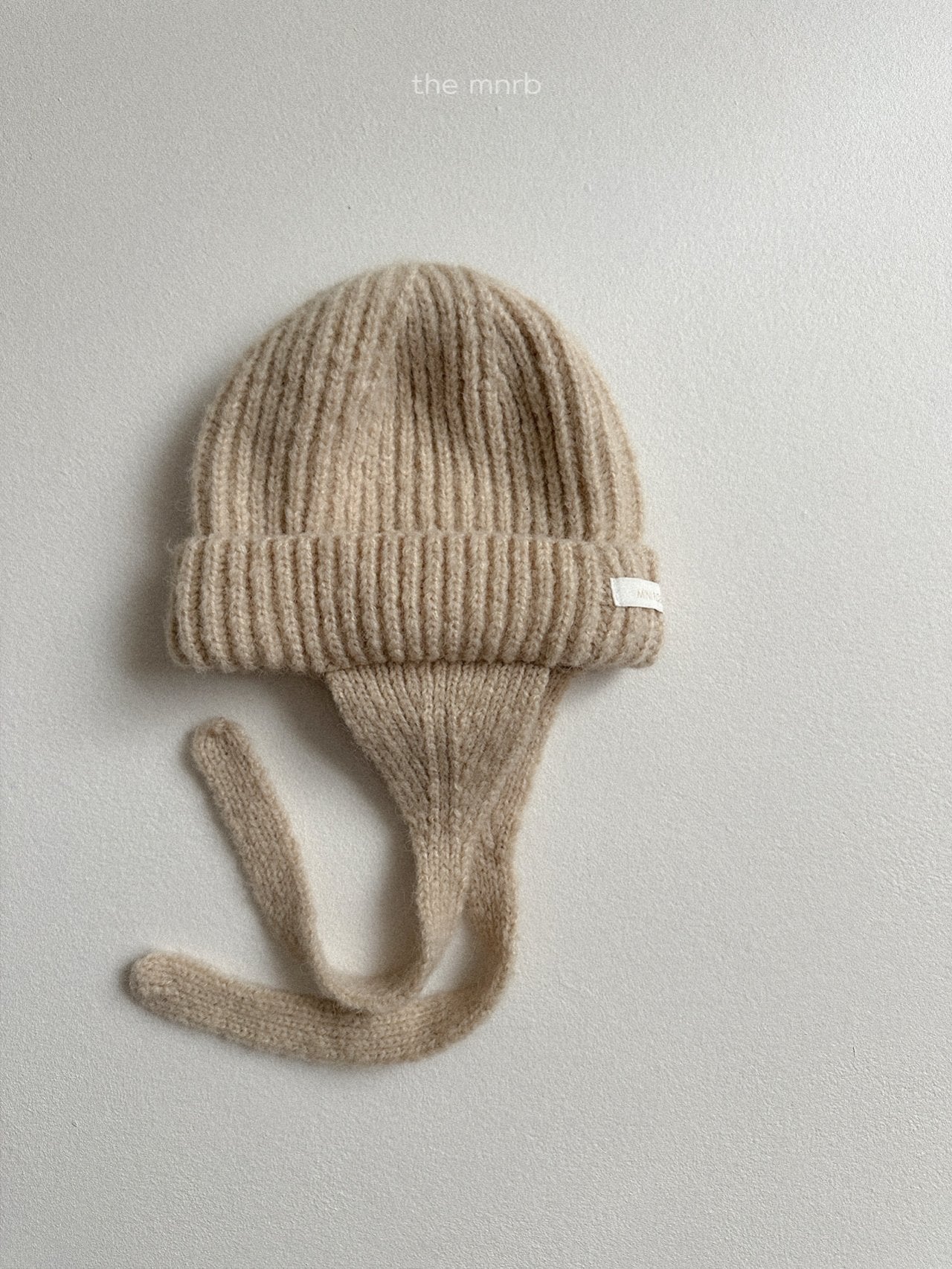Ear flap round beanie