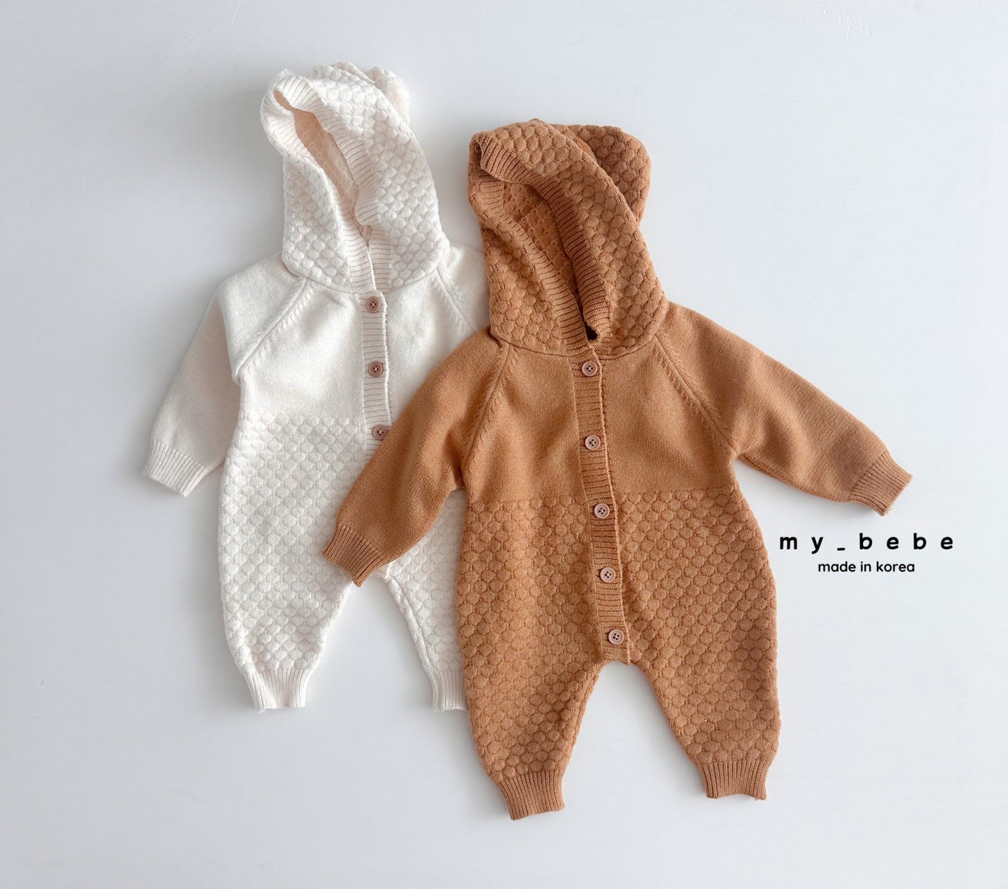 Pompom hooded knit onesie