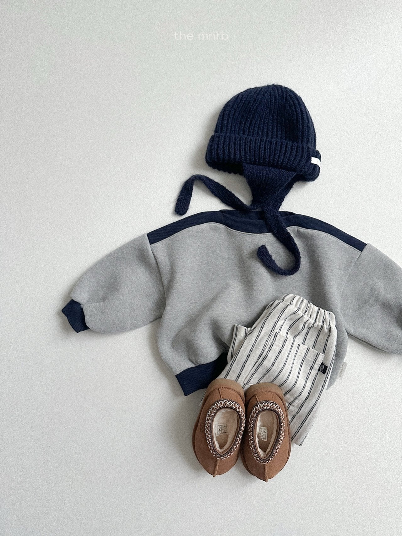 Ear flap round beanie