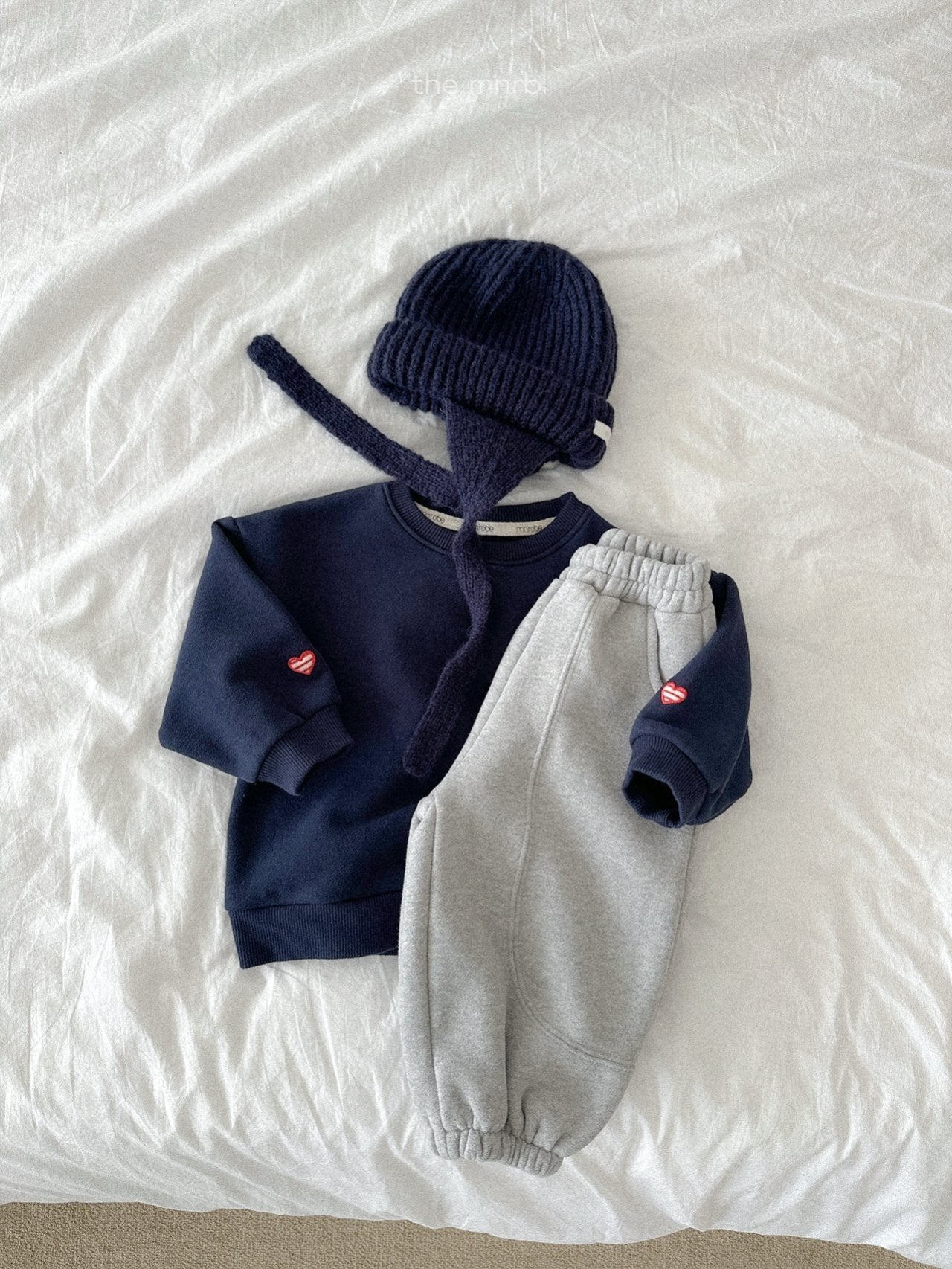 Ear flap round beanie