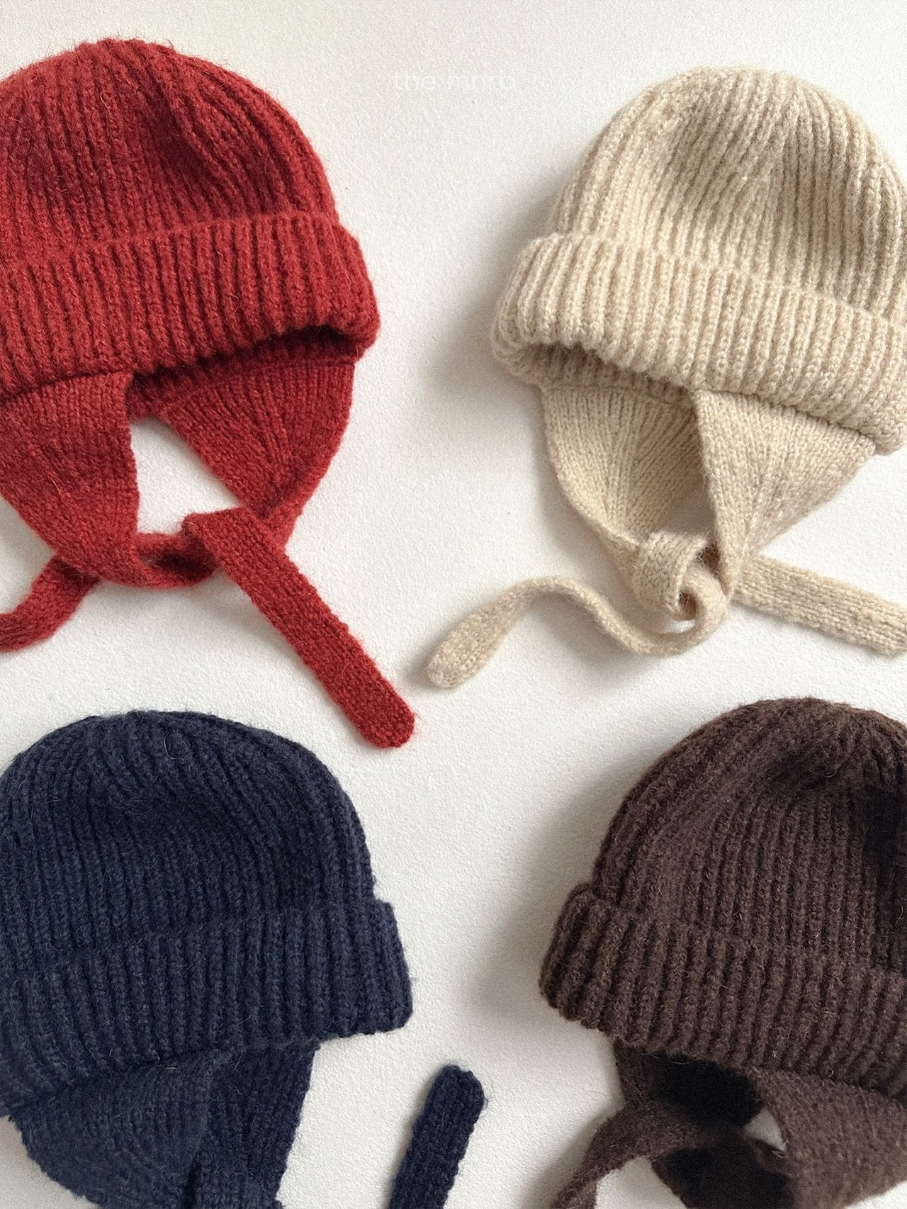 Ear flap round beanie
