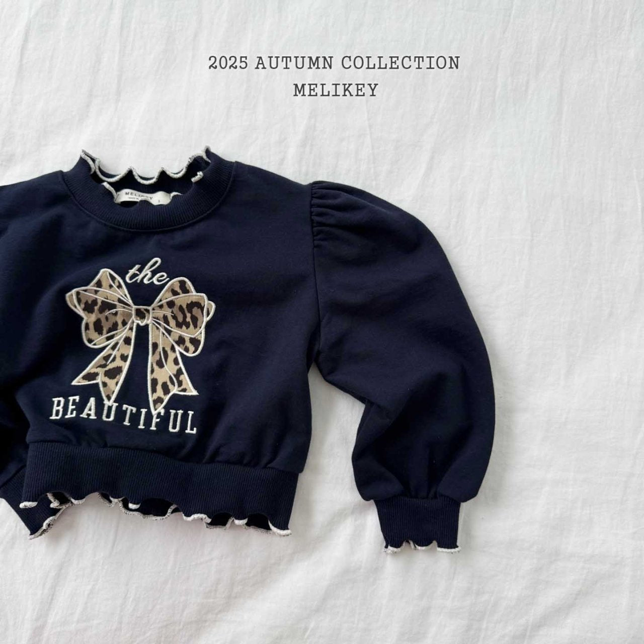 Leopard print ribbon sweatshirt