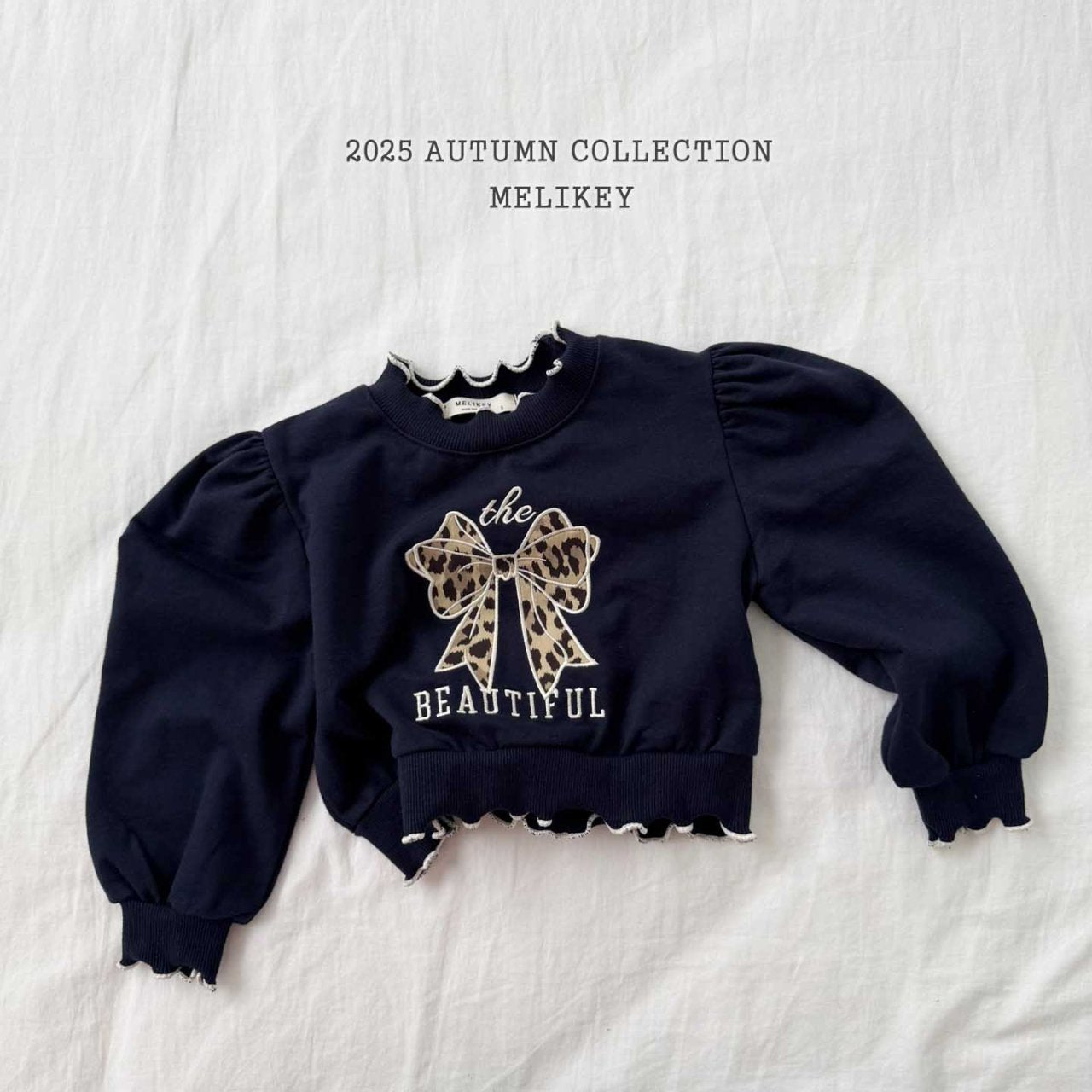 Leopard print ribbon sweatshirt