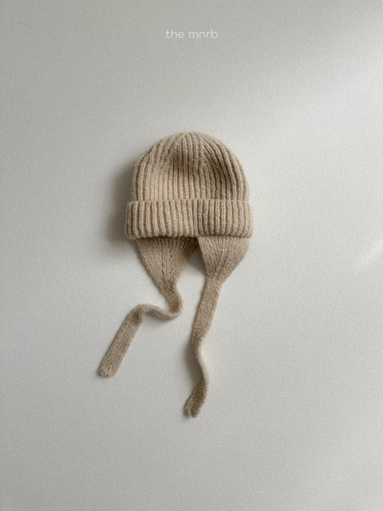 Ear flap round beanie