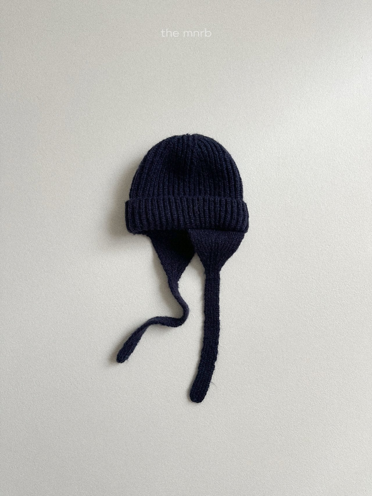 Ear flap round beanie