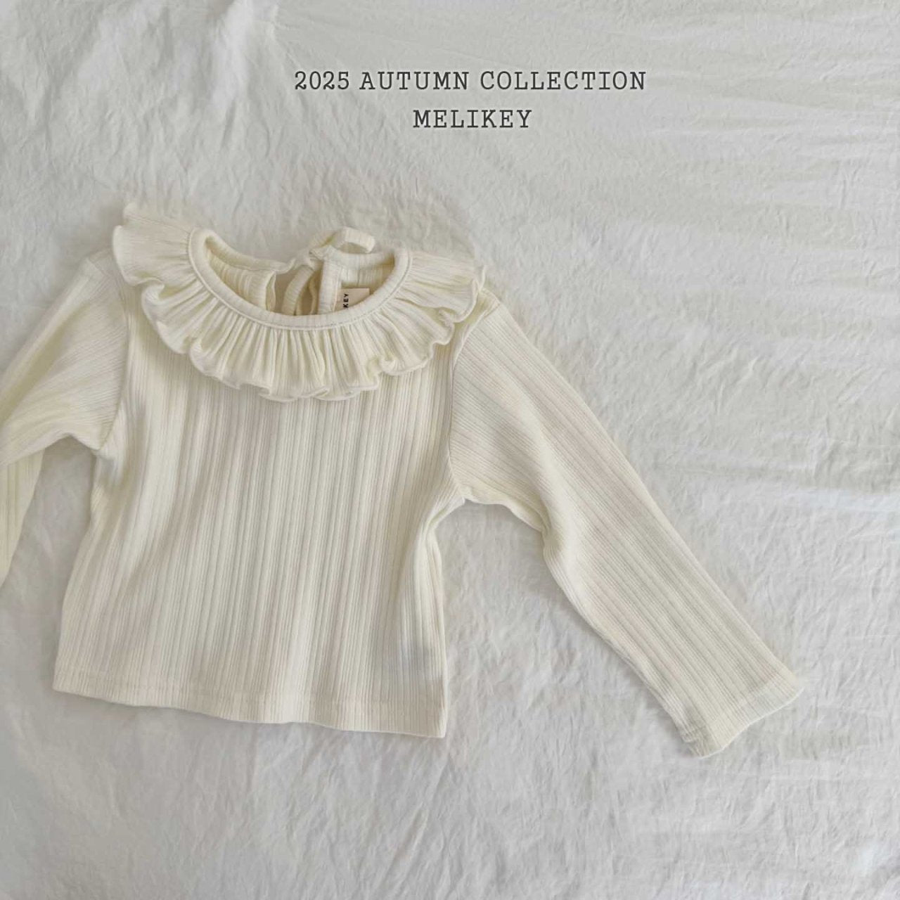 Petit frill top