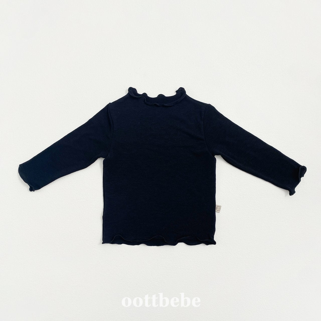 Enough frills top