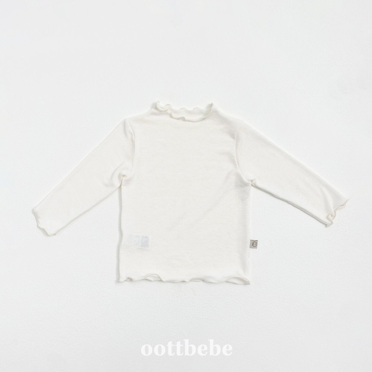 Enough frills top
