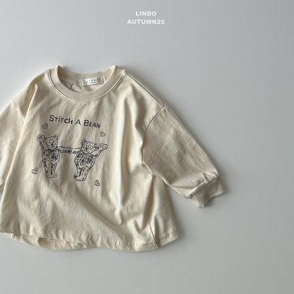 Stitched bear top