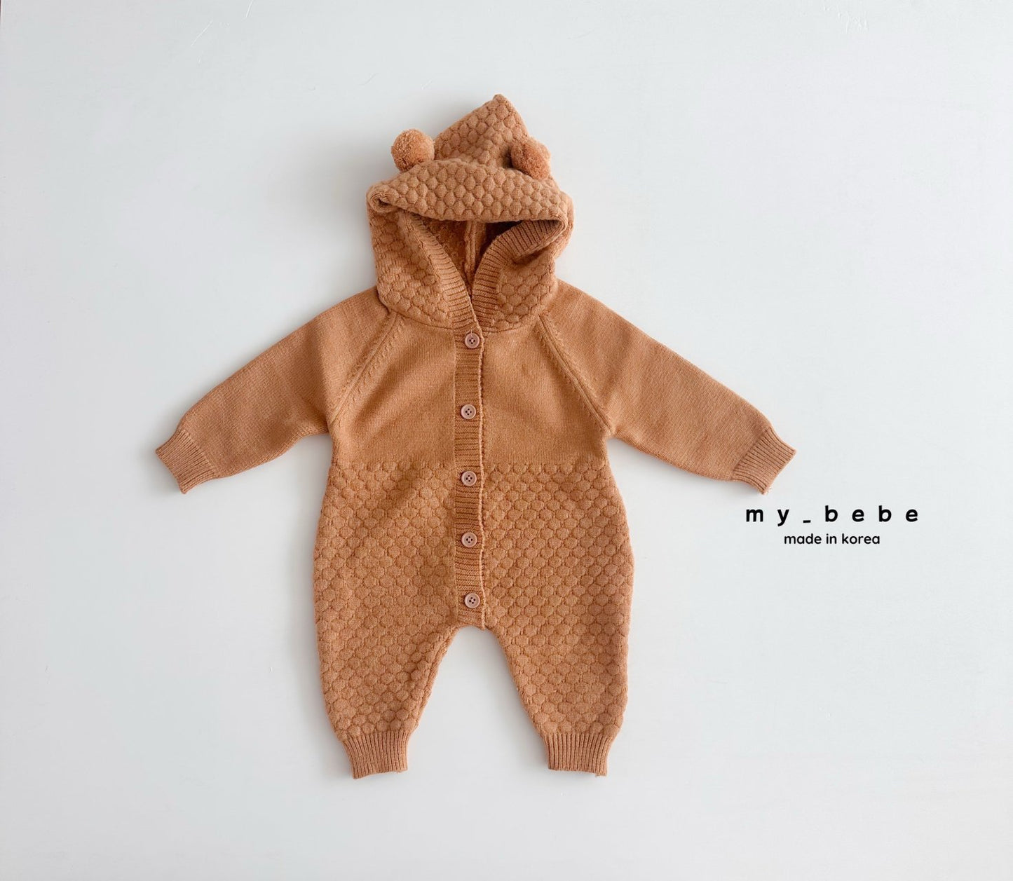 Pompom hooded knit onesie